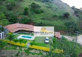 Foto 1 de Fazenda/Sítio com 3 Quartos à venda, 200m² em Centro, Natividade da Serra