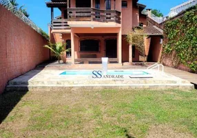 Foto 1 de Casa com 4 Quartos para venda ou aluguel, 215m² em Cocanha, Caraguatatuba