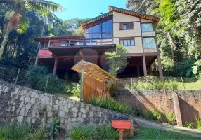 Foto 1 de Casa de Condomínio com 3 Quartos à venda, 241m² em Serra da Cantareira, Mairiporã