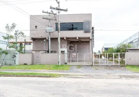 Foto 1 de Galpão/Depósito/Armazém à venda, 899m² em Restinga, Porto Alegre