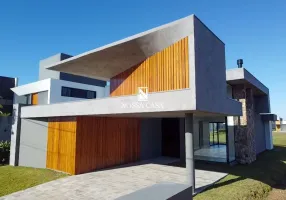 Foto 1 de Casa de Condomínio com 3 Quartos à venda, 230m² em Centro, Torres