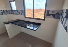 Foto 1 de Casa de Condomínio com 2 Quartos à venda, 46m² em Balneário Maracanã, Praia Grande