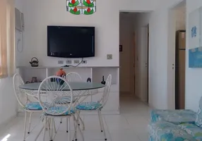 Foto 1 de Apartamento com 2 Quartos à venda, 63m² em Praia das Pitangueiras, Guarujá