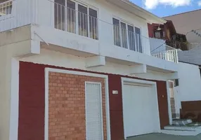 Foto 1 de Casa com 3 Quartos à venda, 199m² em Vila Nova, Porto Alegre