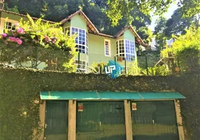 Foto 1 de Casa com 5 Quartos à venda, 250m² em Cosme Velho, Rio de Janeiro