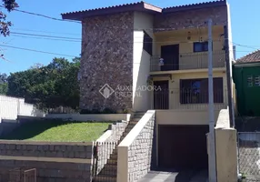Foto 1 de Casa com 3 Quartos à venda, 265m² em Vila Ipiranga, Porto Alegre