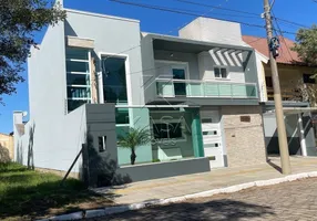 Foto 1 de Sobrado com 3 Quartos à venda, 360m² em Marechal Rondon, Canoas