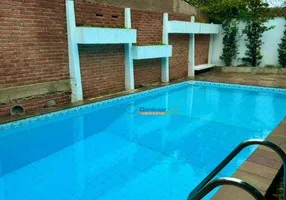 Foto 1 de Casa de Condomínio com 4 Quartos à venda, 470m² em Jardim Virgínia , Guarujá