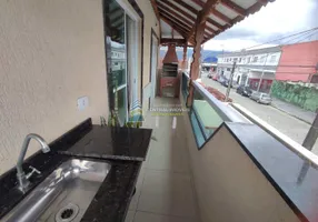 Foto 1 de Casa de Condomínio com 2 Quartos à venda, 61m² em Vila Caicara, Praia Grande