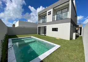 Foto 1 de Casa de Condomínio com 4 Quartos à venda, 190m² em Centro, Camaçari