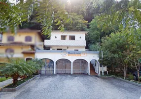 Foto 1 de Casa com 3 Quartos à venda, 144m² em Praia das Pitangueiras, Guarujá