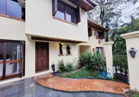 Foto 1 de Casa de Condomínio com 4 Quartos à venda, 325m² em Boa Vista, Porto Alegre