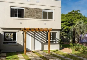 Foto 1 de Casa de Condomínio com 2 Quartos à venda, 59m² em Vila Nova, Porto Alegre