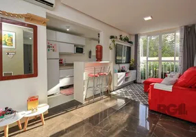 Foto 1 de Apartamento com 2 Quartos à venda, 60m² em Vila Nova, Porto Alegre