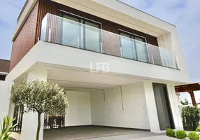 Foto 1 de Casa de Condomínio com 4 Quartos à venda, 234m² em Braço, Camboriú