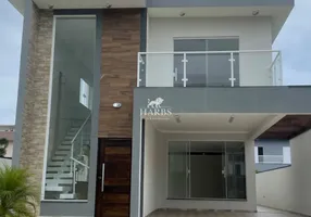 Foto 1 de Casa de Condomínio com 4 Quartos à venda, 300m² em Jardim das Palmeiras, Itanhaém