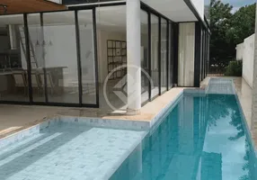 Foto 1 de Casa de Condomínio com 4 Quartos à venda, 360m² em Jardins Valencia, Goiânia