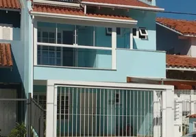 Foto 1 de Casa com 4 Quartos à venda, 230m² em Ipanema, Porto Alegre