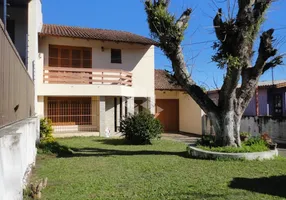 Foto 1 de Casa com 3 Quartos à venda, 205m² em Vila Nova, Porto Alegre