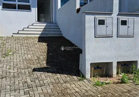 Foto 1 de Casa de Condomínio com 3 Quartos à venda, 111m² em Mário Quintana, Porto Alegre