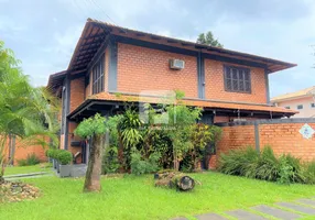 Foto 1 de Casa com 5 Quartos à venda, 550m² em Itacorubi, Florianópolis