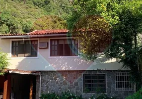 Foto 1 de Casa com 4 Quartos à venda, 360m² em Barra da Tijuca, Rio de Janeiro