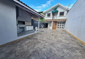 Foto 1 de Sobrado com 3 Quartos à venda, 142m² em Jardim Terralão, Caraguatatuba