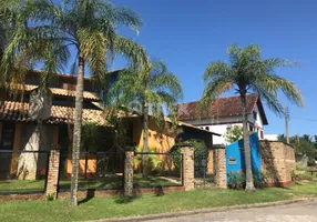 Foto 1 de Casa com 7 Quartos à venda, 562m² em Camboinhas, Niterói