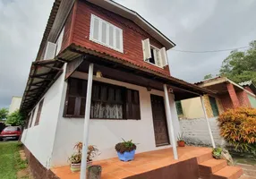 Foto 1 de Casa com 4 Quartos à venda, 117m² em Cavalhada, Porto Alegre