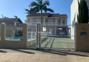 Foto 1 de Casa com 7 Quartos à venda, 260m² em Centro, Torres