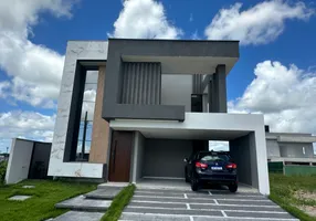 Foto 1 de Casa de Condomínio com 4 Quartos à venda, 210m² em Cidade Alpha, Eusébio