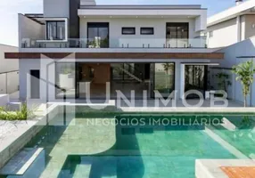 Foto 1 de Casa de Condomínio com 4 Quartos para venda ou aluguel, 450m² em Residencial Jatibela, Campinas