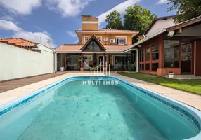 Foto 1 de Casa com 3 Quartos à venda, 247m² em Vila Ipiranga, Porto Alegre
