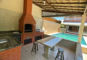 Foto 1 de Casa com 4 Quartos à venda, 310m² em Cidade Ocian, Praia Grande