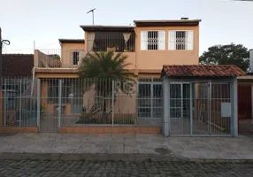 Foto 1 de Casa com 4 Quartos à venda, 89m² em Restinga Nova, Porto Alegre