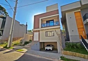 Foto 1 de Casa de Condomínio com 3 Quartos à venda, 239m² em Santa Cândida, Curitiba