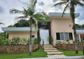 Foto 1 de Casa de Condomínio com 4 Quartos à venda, 295m² em Balneário Praia do Pernambuco, Guarujá