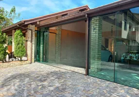 Foto 1 de Casa de Condomínio com 4 Quartos à venda, 239m² em Armação, Florianópolis