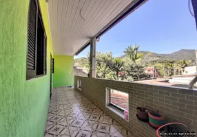 Foto 1 de Casa com 4 Quartos à venda, 180m² em Estufa II, Ubatuba