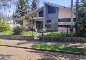 Foto 1 de Casa com 3 Quartos à venda, 570m² em Jardim Lindóia, Porto Alegre