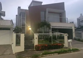 Foto 1 de Casa com 4 Quartos à venda, 270m² em Cidade Universitaria Pedra Branca, Palhoça