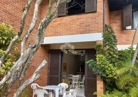 Foto 1 de Casa de Condomínio com 2 Quartos à venda, 61m² em Canasvieiras, Florianópolis