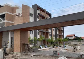 Foto 1 de Apartamento com 2 Quartos à venda, 64m² em Guarajuba, Camaçari