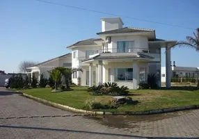 Foto 1 de Casa de Condomínio com 4 Quartos à venda, 385m² em Centro, Imbé