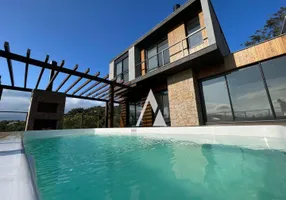 Foto 1 de Casa de Condomínio com 4 Quartos à venda, 161m² em Praia da Ferrugem, Garopaba
