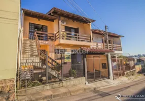 Foto 1 de Casa com 5 Quartos à venda, 253m² em Jardim Itú Sabará, Porto Alegre