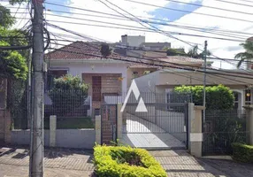 Foto 1 de Casa com 5 Quartos à venda, 396m² em Santo Antônio, Porto Alegre