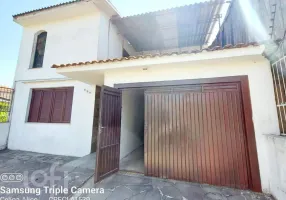 Foto 1 de Casa com 3 Quartos à venda, 128m² em Santo Antônio, Porto Alegre