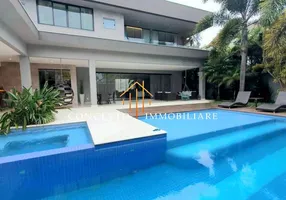 Foto 1 de Casa de Condomínio com 5 Quartos para venda ou aluguel, 760m² em Barra da Tijuca, Rio de Janeiro