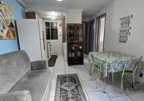 Foto 1 de Apartamento com 2 Quartos à venda, 38m² em Vila Nova, Porto Alegre